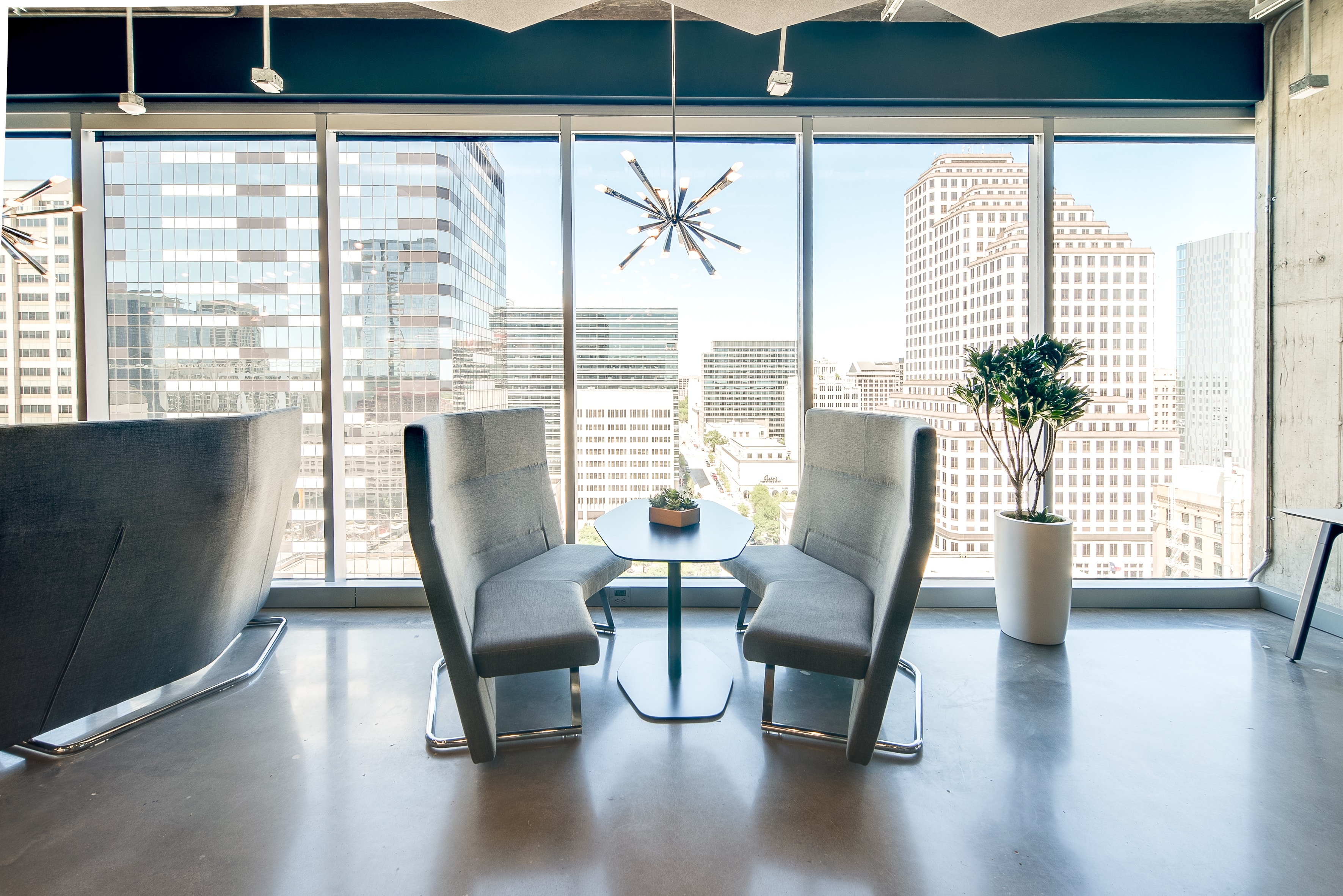 Modern office lounge overlooking city skyline